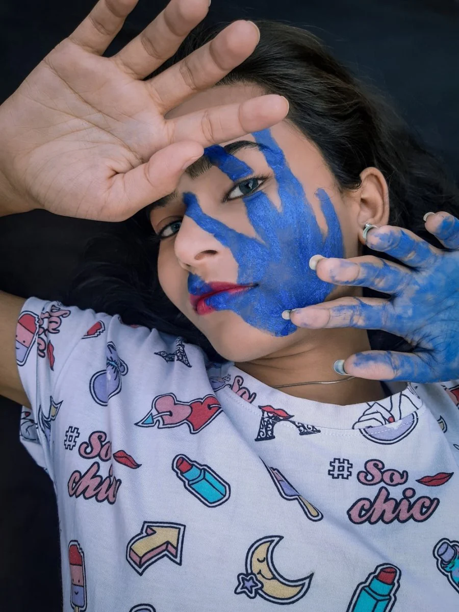 Paint By Numbers | Lucknow - Girl In White And Red Shirt With Blue Paint On Face