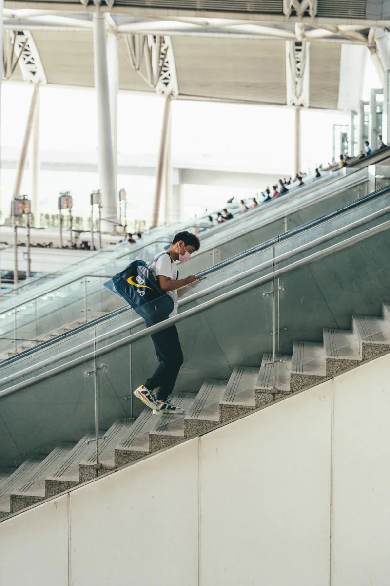Paint By Numbers | Dongguan - Man In Blue Jacket And Black Pants On Gray Concrete Staircase