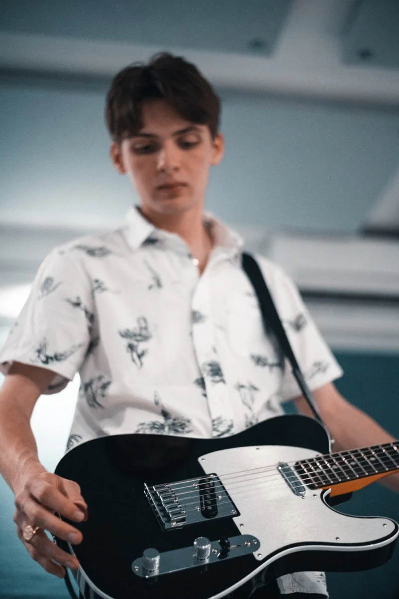 Paint By Numbers | Bass - Man In White And Black Floral Button Up Shirt Playing Guitar