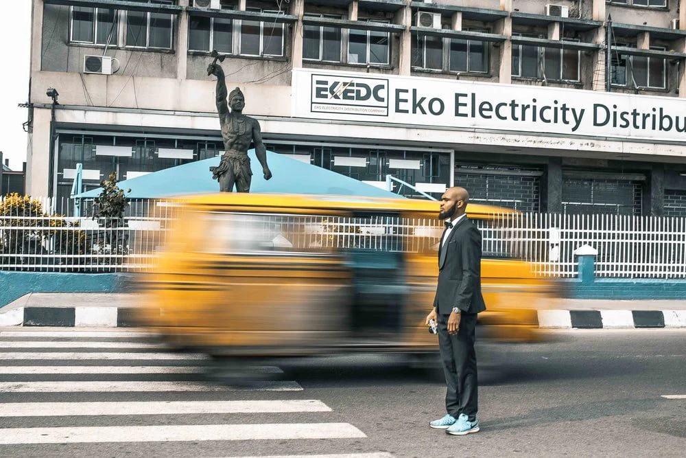 Paint By Numbers | Lagos - Man Standing At Grey Concrete Road
