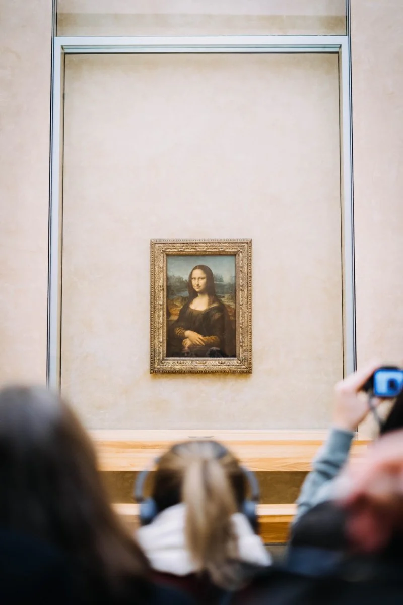 Paint By Numbers | People Facing Mona Lisa Painting Hung On Wall Inside Room
