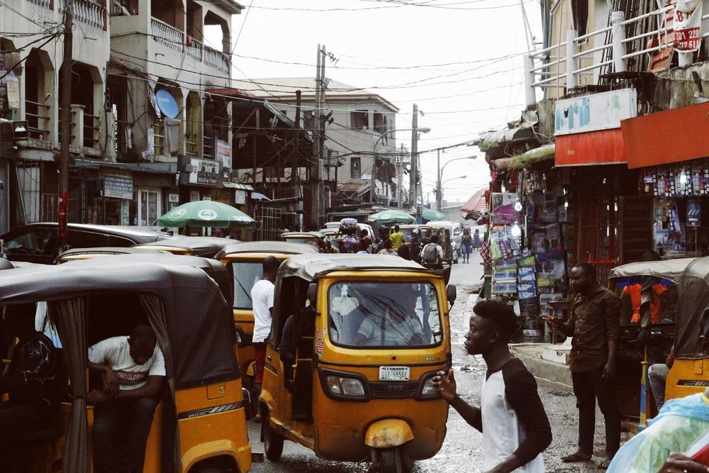 Paint By Numbers | Lagos - People On Street And Different Vehicles Near Buildings During Daytime