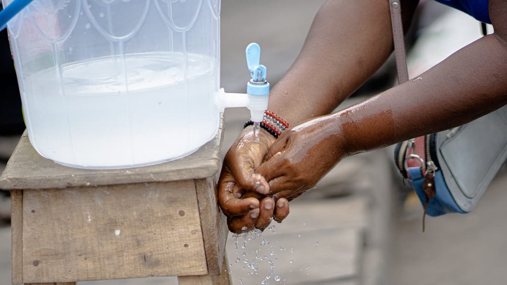 Paint By Numbers | Lagos - Person Holding White Plastic Bottle