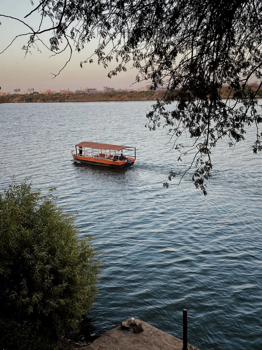 Paint By Numbers | Khartoum - Red Boat On Body Of Water During Daytime
