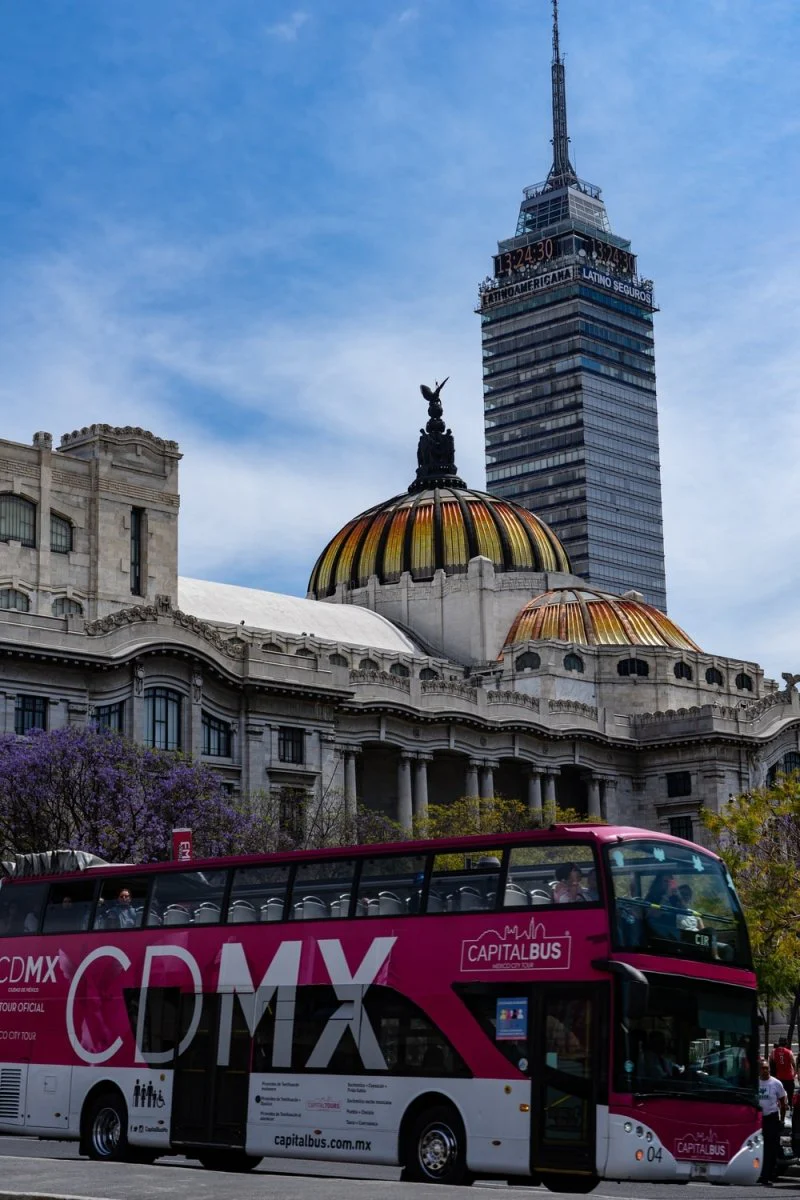 Paint By Numbers | Red Bus Near Brown Concrete Building During Daytime