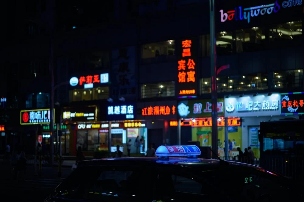Paint By Numbers | Shenzhen - Taxi On Road Beside Stores