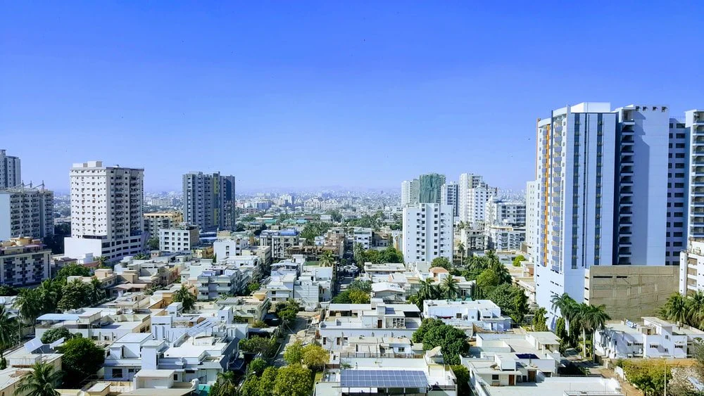 Paint By Numbers | Karachi - White And Gray Concrete Buildings During Daytime