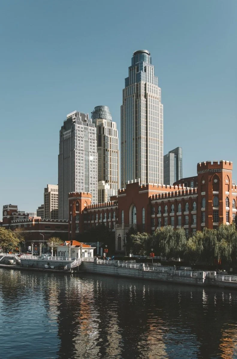 Paint By Numbers | Tianjin - White Boat On Water Near Brown Concrete Building During Daytime
