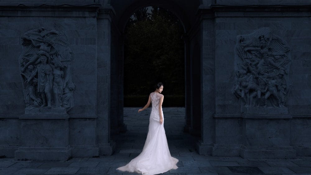 Paint By Numbers | Shijiazhuang - Woman Wearing White Sleeveless Wedding Gown Body Facing Towards Building While Face Looking Sideways
