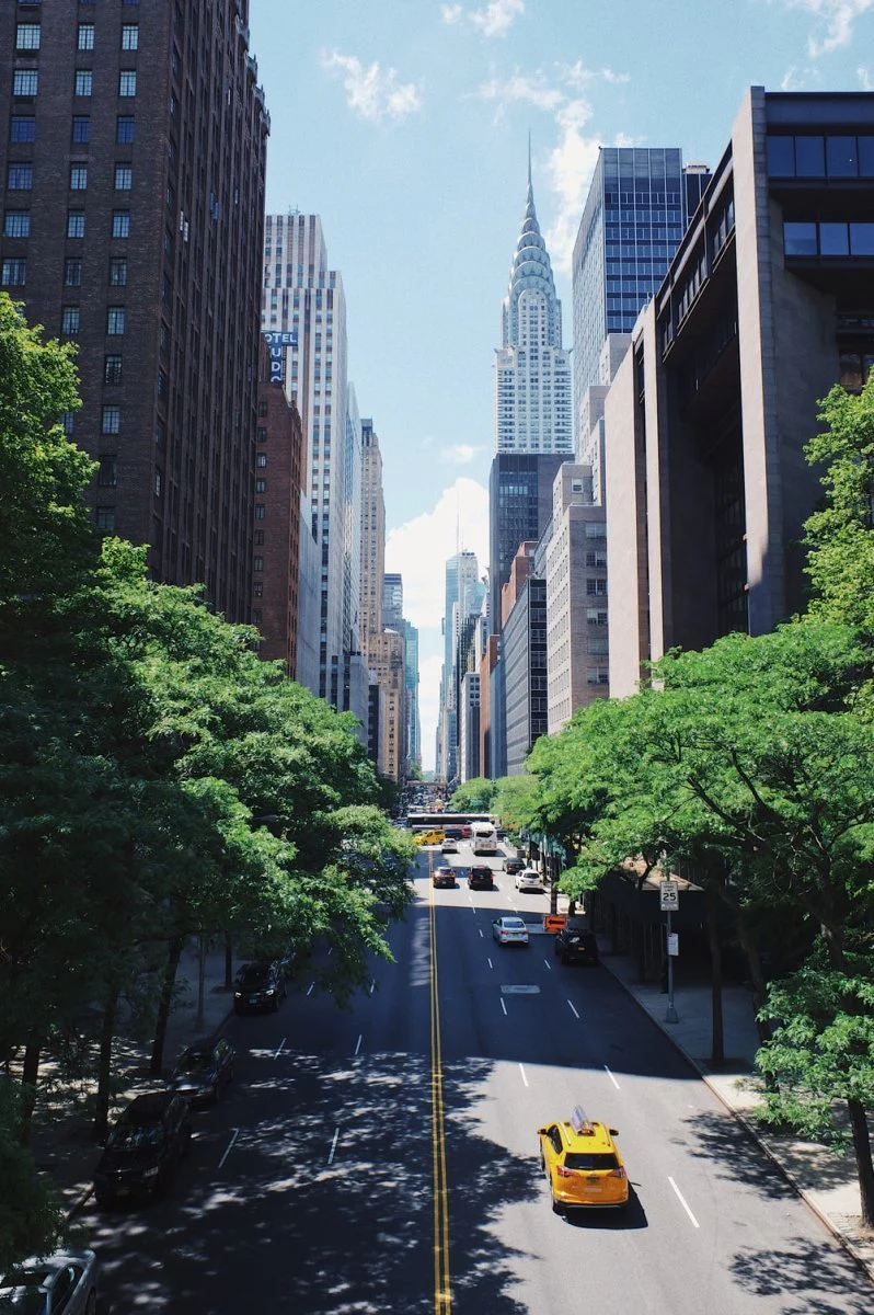 Paint By Numbers | New York - Yellow Car Running On The Street Between The Building During Daytime